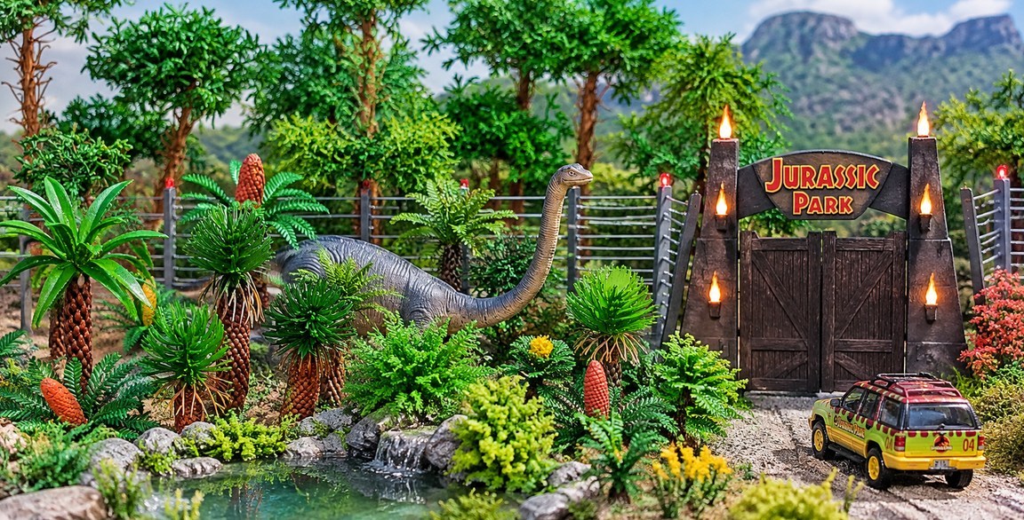 Diorama prehistórico de Nature Center con dinosaurios y vegetación a escala